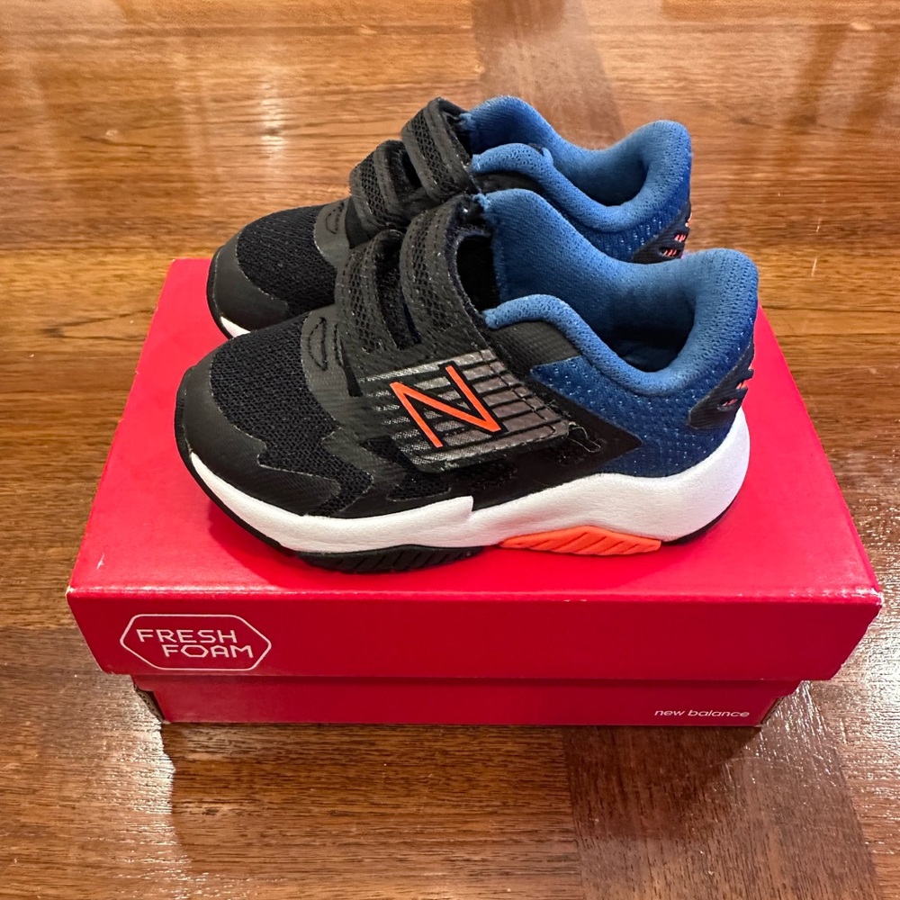 New Balance Rave Running Shoe, Black/Blue/Orange, Baby/Walker Size 4